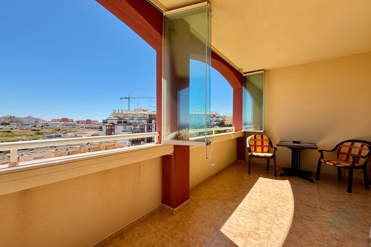 Apartmán se zasklenou terasou a výhledem na moře v komplexu Torresol, La Mata, Španělsko - foto 23